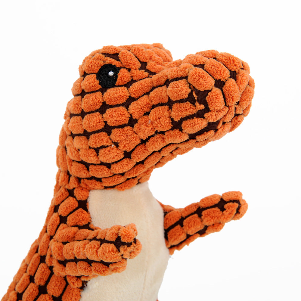 Dinosaurio de peluche con chirriador, incluido en el pack para cachorro