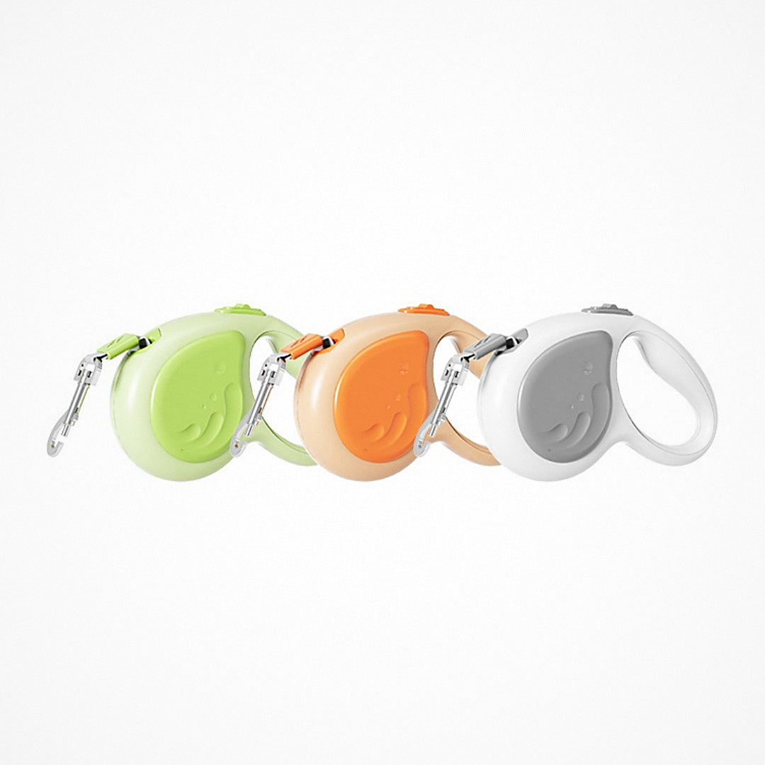 Los tres colores de la correa extensible: verde, naranja y gris